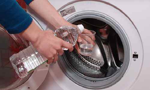 تمیز کردن ماشین لباسشویی با سرکه و جوش شیرین